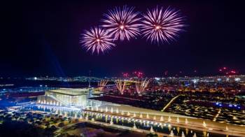 A fireworks show covers the sky at the Stavros Niarchos Foundation Cultural Center